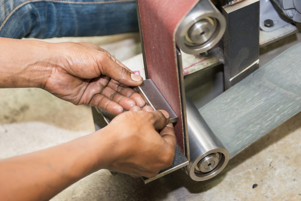 A closeup of deburring services